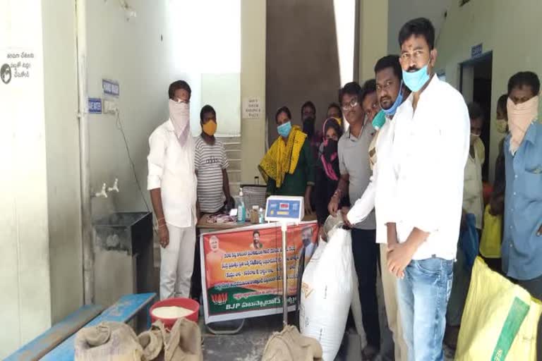 bjp leaders inspected free ration distribution in siddipet district husnabad