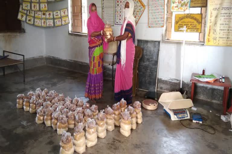 Distribution of ration through Anganwadi center