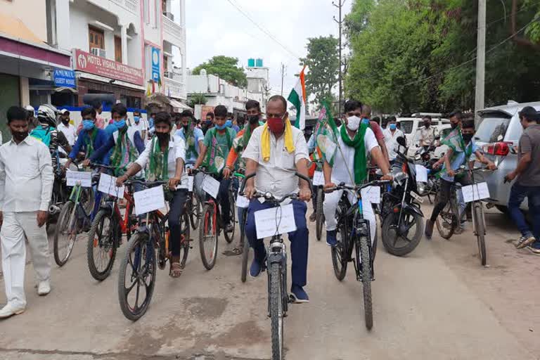 RJD workers organize a bicycle rally on the foundation day of the party in Gaya