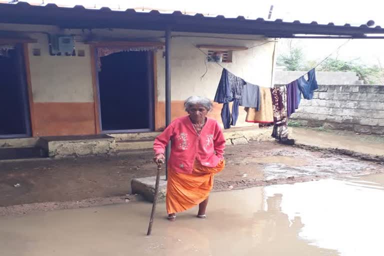 Saidapura old women house surrounded by rain water 