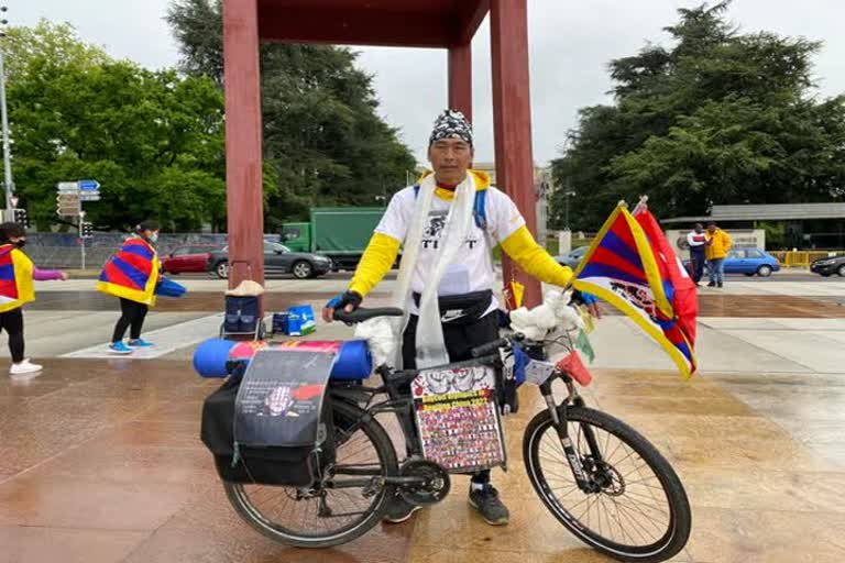 Swiss Tibetan സ്വിസ് ടിബറ്റൻ solo-cycle rally സൈക്കിൾ റാലി സോളോ സൈക്കിൾ റാലി cycle rally ജനീവ geneva tibet ടിബറ്റ് ചൈന ചൈന അധിനിവേശം Chinese violence china സിറിങ് വാങ്‌ഡു Tsering Wangdu യുഎൻ മനുഷ്യാവകാശ കമ്മീഷൻ UN Human Rights Commission