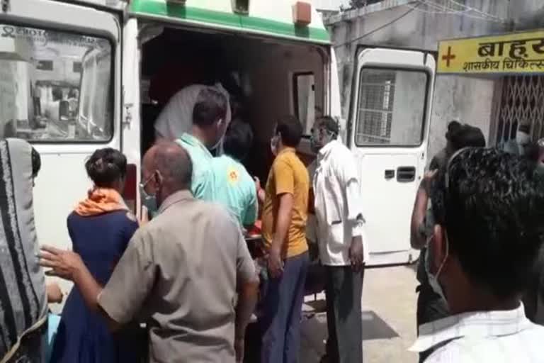 Taking injured woman to hospital