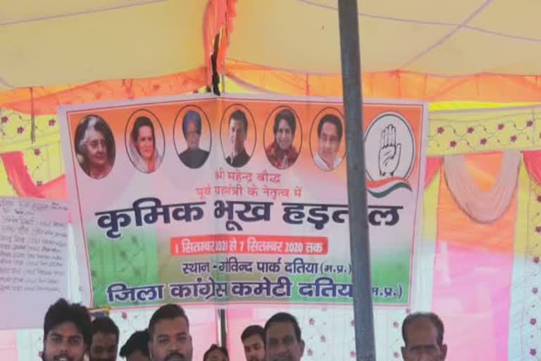 Nsui worker sitting on strike