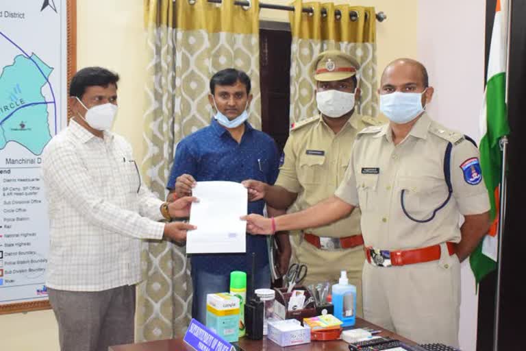 nirmal sp distributed 5 acres of land pass book to former mavoist