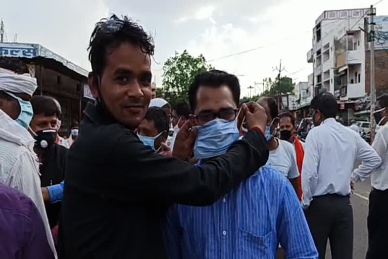 Masks distributed to people by BJYM