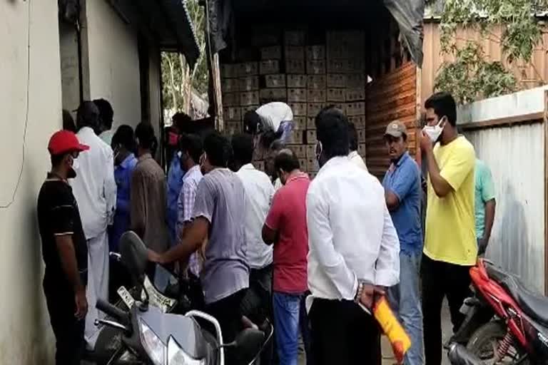 croud at liquor shops, Kodada