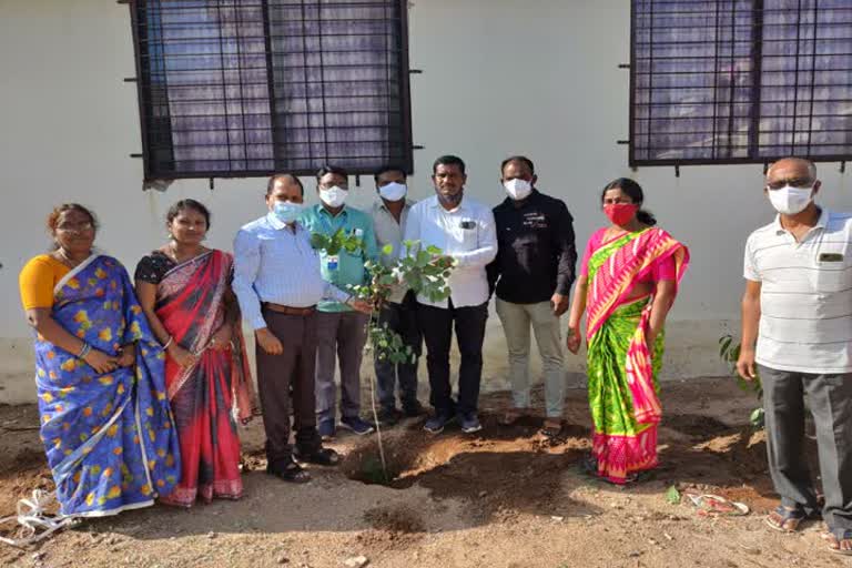 Officers planted the plants at nirmal