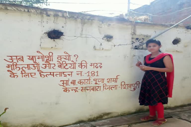 Anganwadi workers doing wall writing