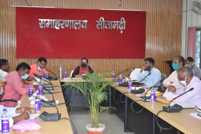 district magistrate held a meeting 