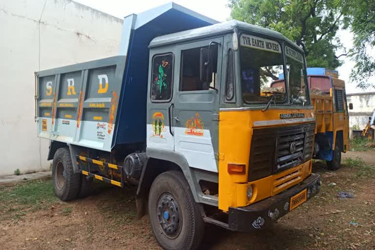 Two trucks seized by gravel soil