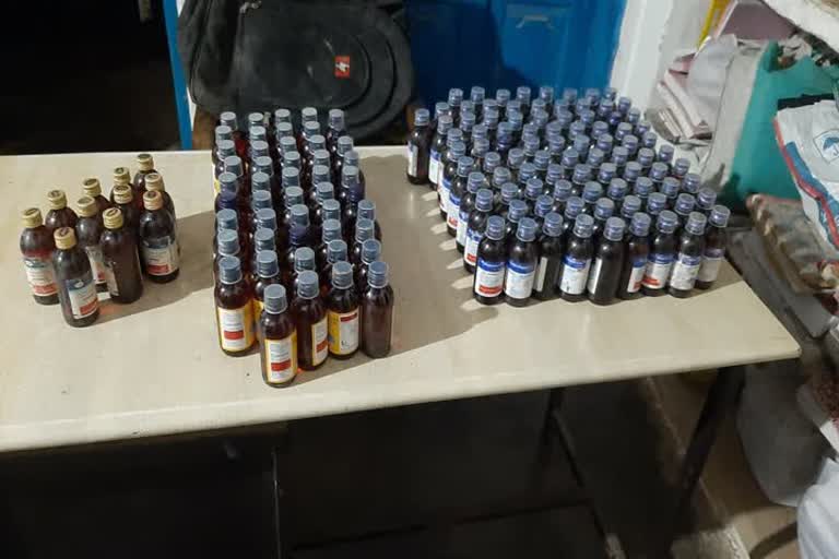 Police arrested woman with Drug Cough Syrup bottles