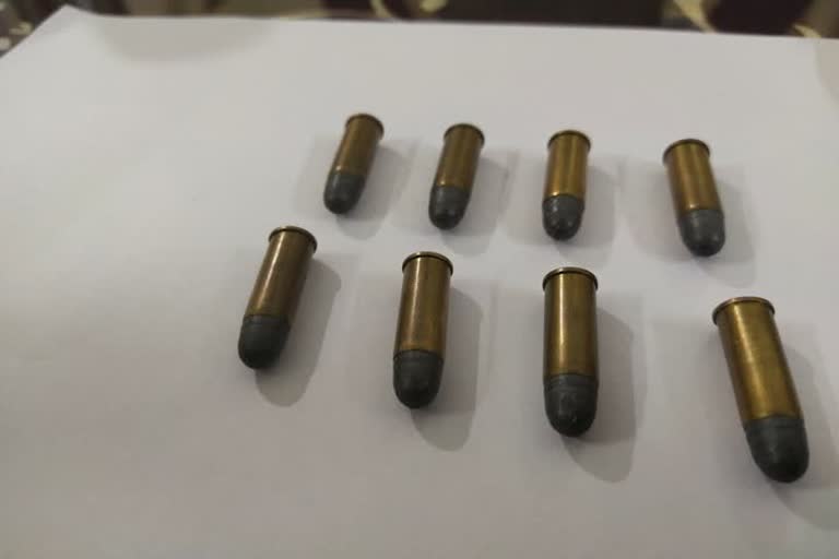 Gun bullets lying on the road