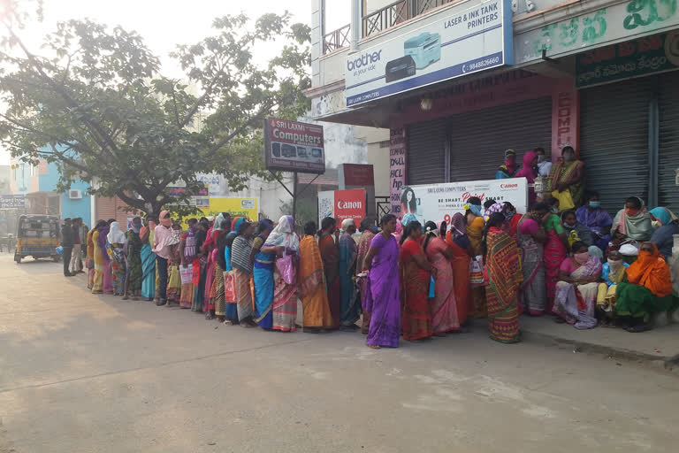 women waiting for aadhar attach to ration card at bhadrachalam mee seva centres in bhadradri kothagudem