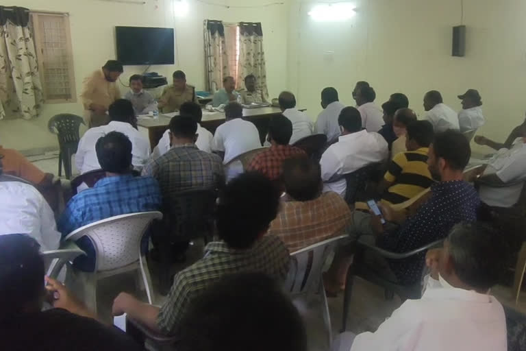 officials talking with fisher men in prakasam