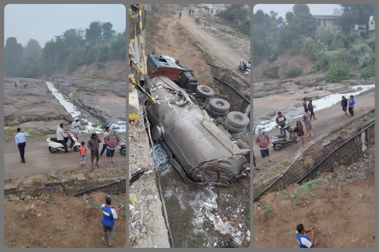 trailer falls off bridge