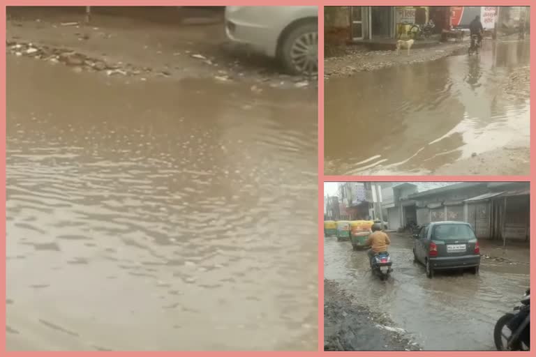 Waterlogging on roads in Begum Pur after rain in delhi