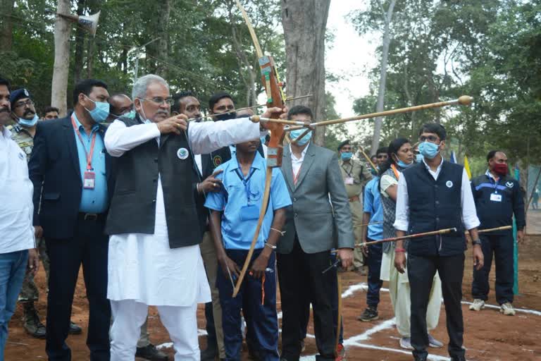 CM Baghel doing archery