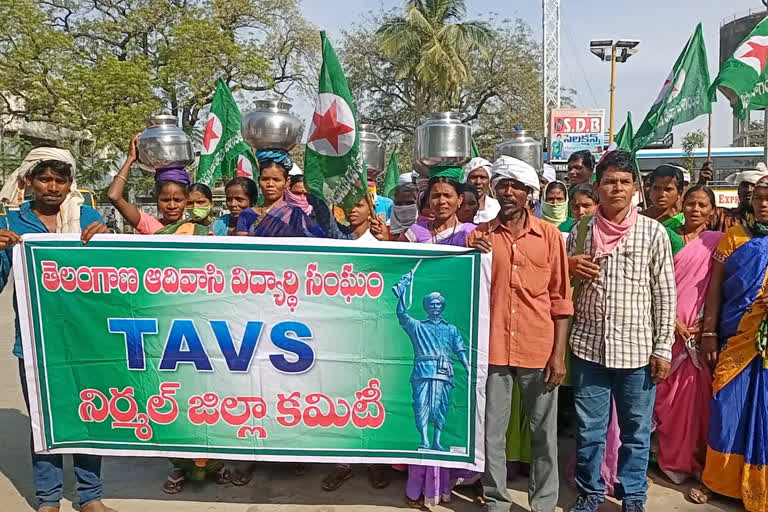 Protest with empty bins to solve water problem in nirmal