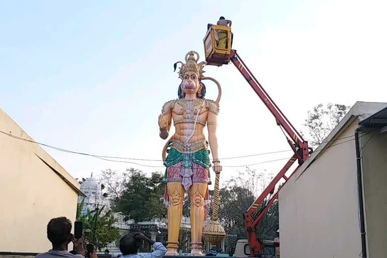 Anointing of the huge Hanuman idol in the  Manchiryala District