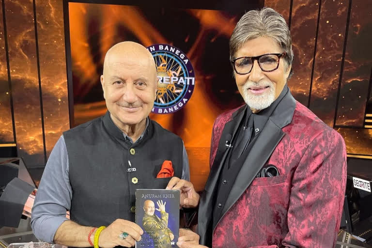 Anupam Kher gifts his latest book to Amitabh Bachchan