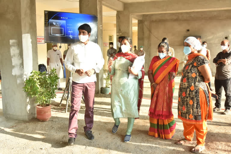 Collector visit govt hospital to check vaccine process arrangements in nizamabad dist