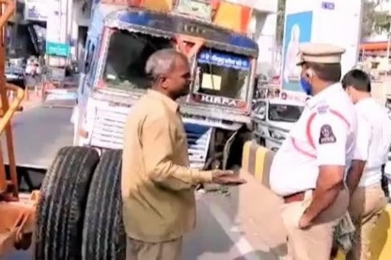 A lorry collided with  Begumpet flyover divider