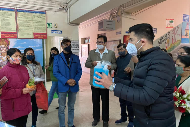 Raghav chaddha distributed mask and sanitizer to School students in delhi