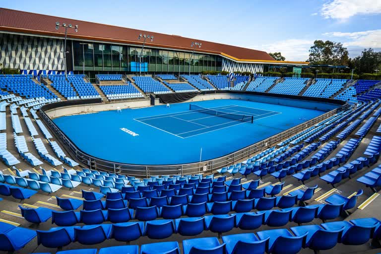 Two Australian Open tennis players have tested positive for Covid-19