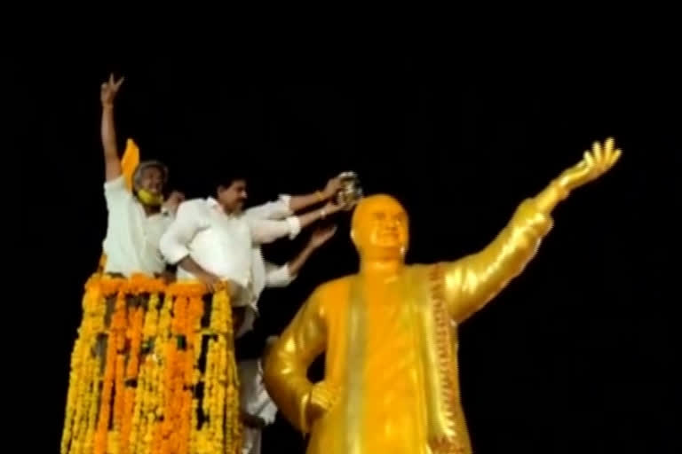 ntr statue anointing milk by devineni uma