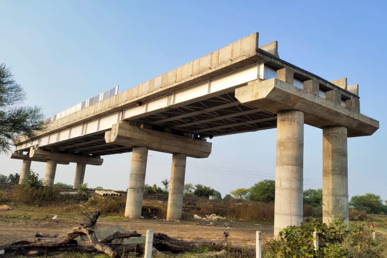 Under bridge unusable and Over bridge incomplete at Tal Road railway gate