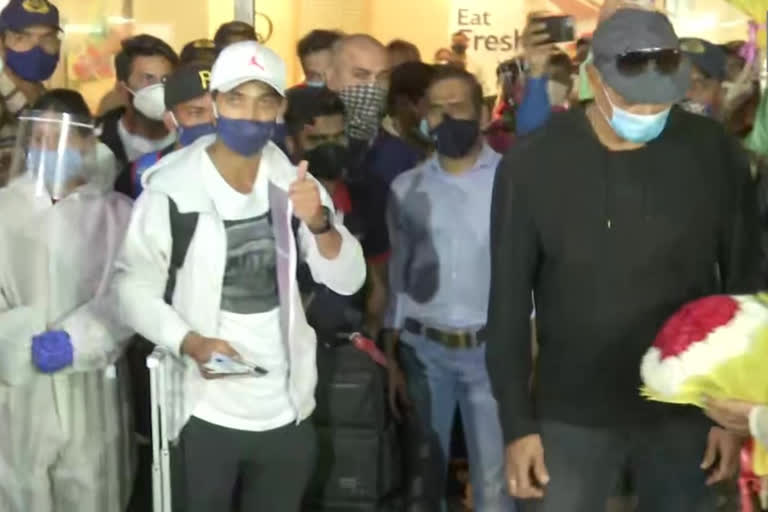 Team India returns home