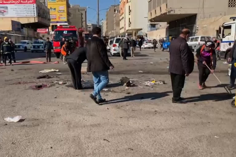 at least seven killed and 25 wounding in twin suicide bombings in baghdad