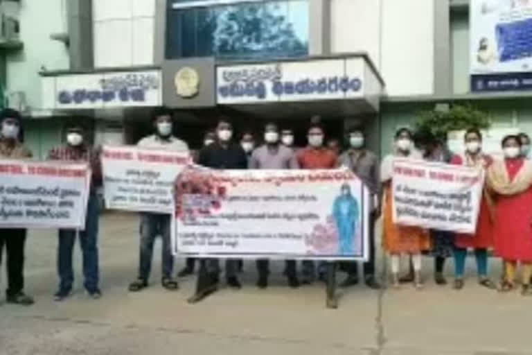 covid contract doctors protest at vizianagaram