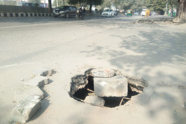 Crater on the road in front of NSIT