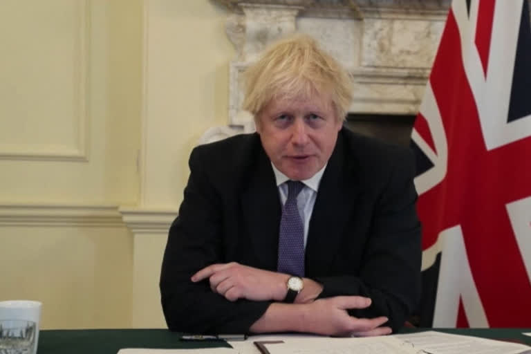 british prime minister boris johnson and joe biden discuss climate change, covid 19