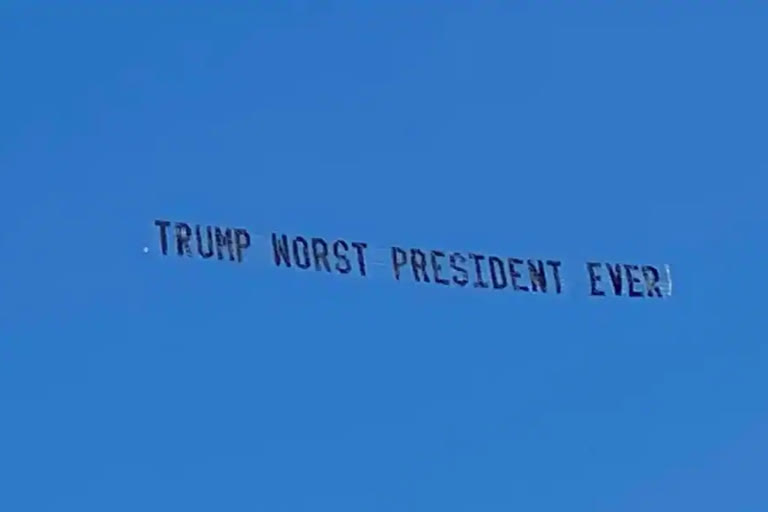 Worst president banner flown near Trumps resort