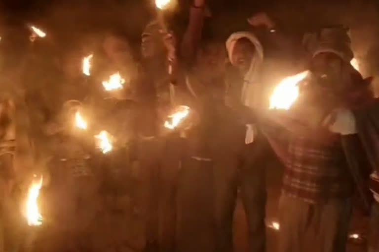 Peasant laborers took out a torch procession in Masaurhi