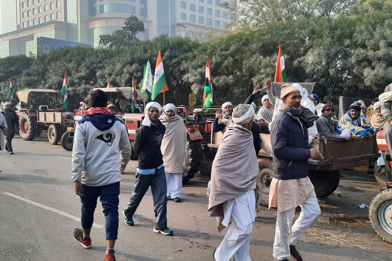 several kilometers of long lines of tractors along  Ghazipur border