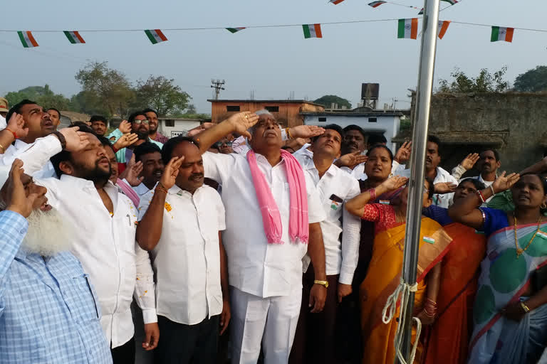 MLA unveiling the national flag