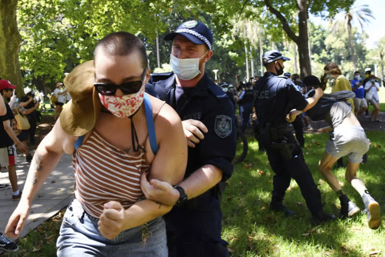 Australia marks national day with protests, calming words