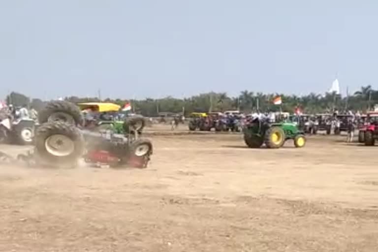 Tractor overturns