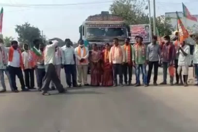 BJP leaders held a rally at Husnabad Ambedkar Chowrasta in Siddipet district to protest against remarks made by MLA Dharma Reddy in Husnabad zone