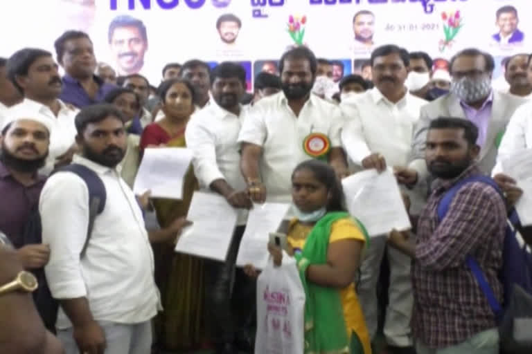 Excise Minister Srinivas Gowda handing over promotion orders to employees in mahaboobnagar