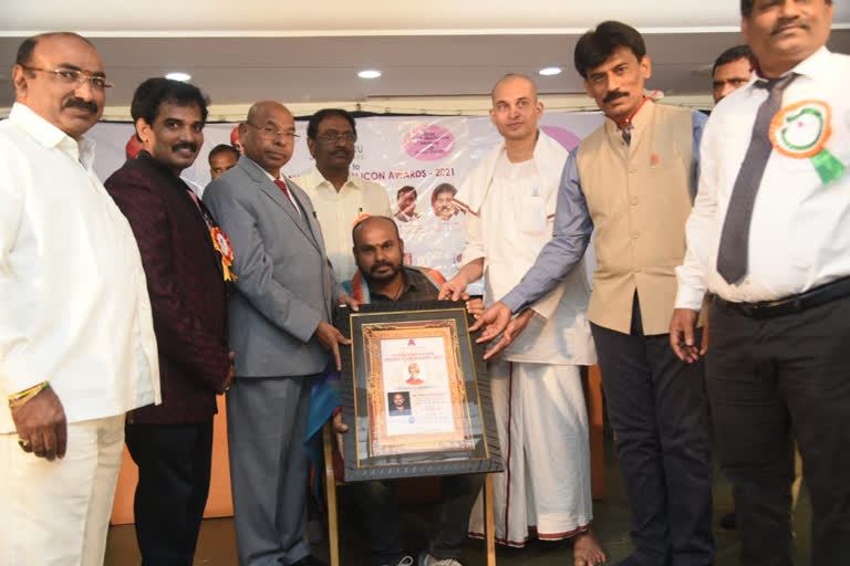 human rights commission justice chandraiah participated in vishwa guru awards at  kukatpally in hyderabad