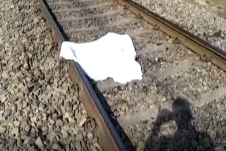 Suicide by jumping in front of train