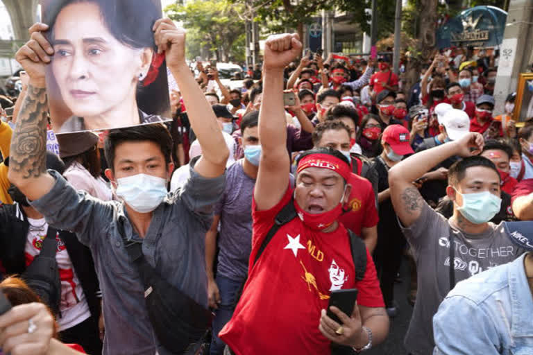 People in Myanmar honk horns, bang on pots to protest coup