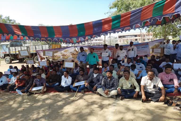 electricity employees protest in nirmal district
