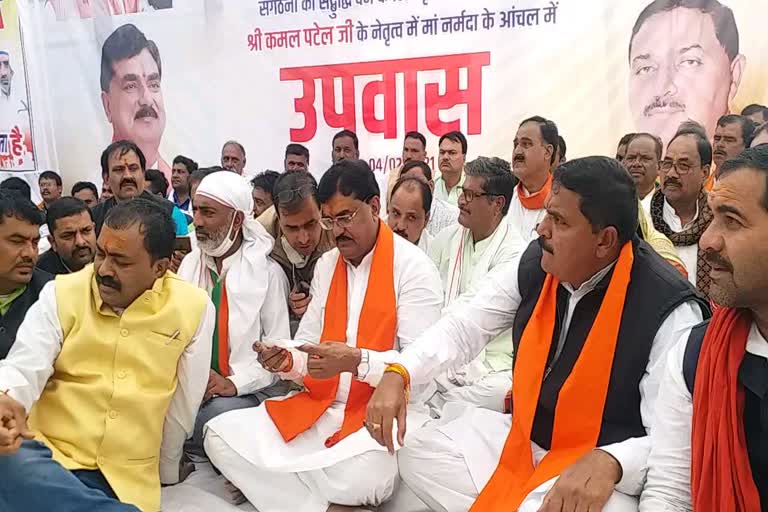 Agriculture Minister Kamal Patel sitting on fast