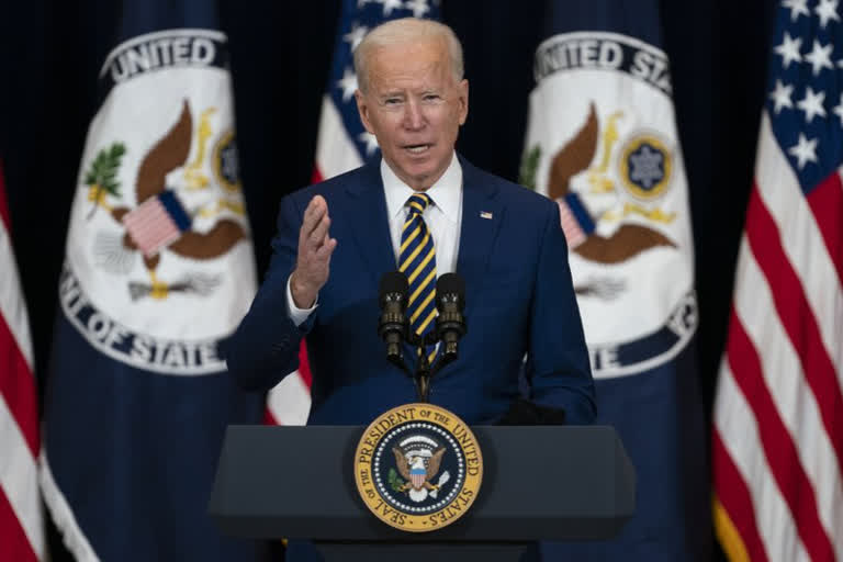 Biden strikes tough tone on Russia in diplomatic push