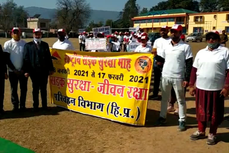 Rally organized under road safety campaign in Bilaspur